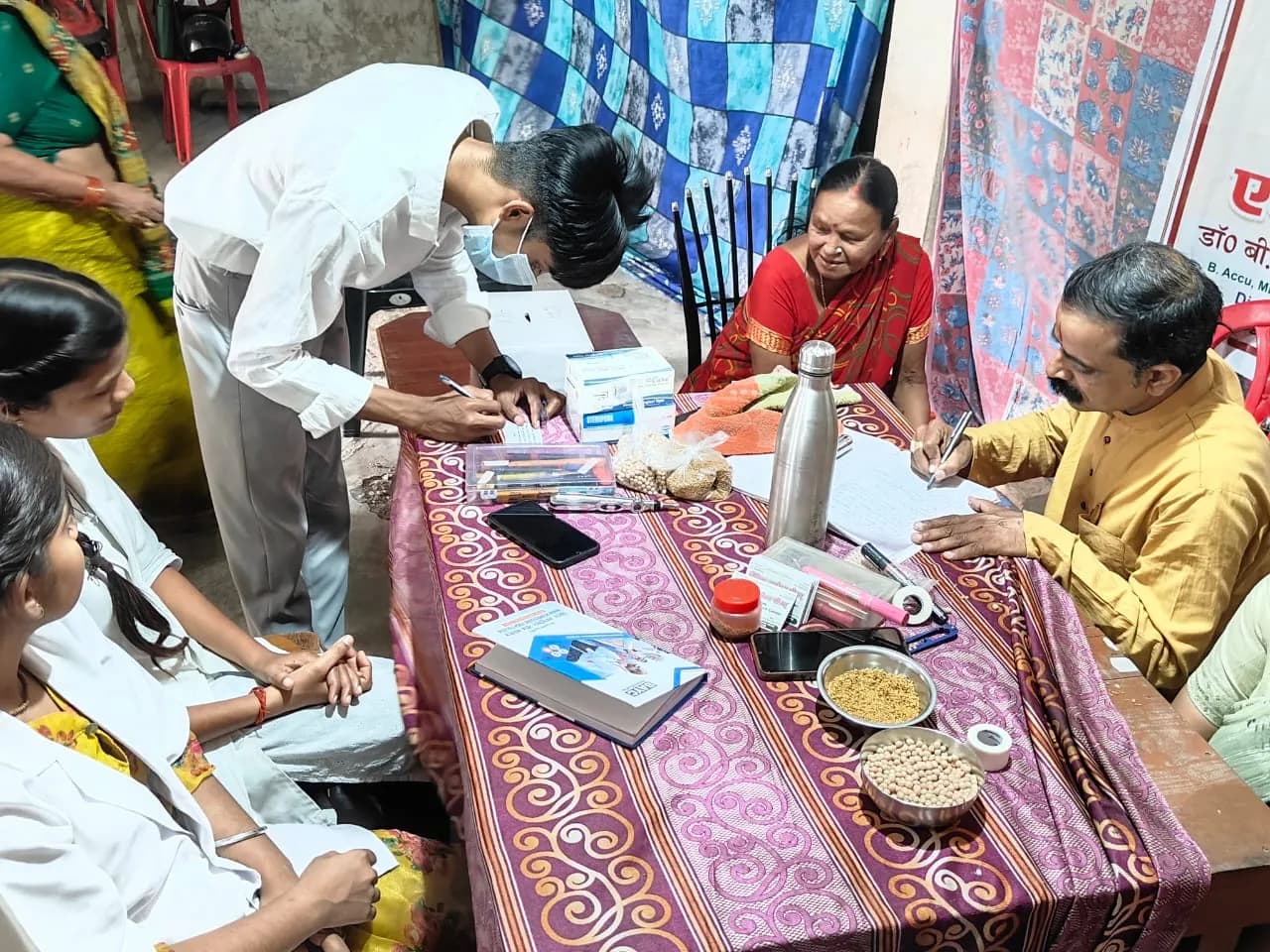 Community programme and participant gathering — photograph 3