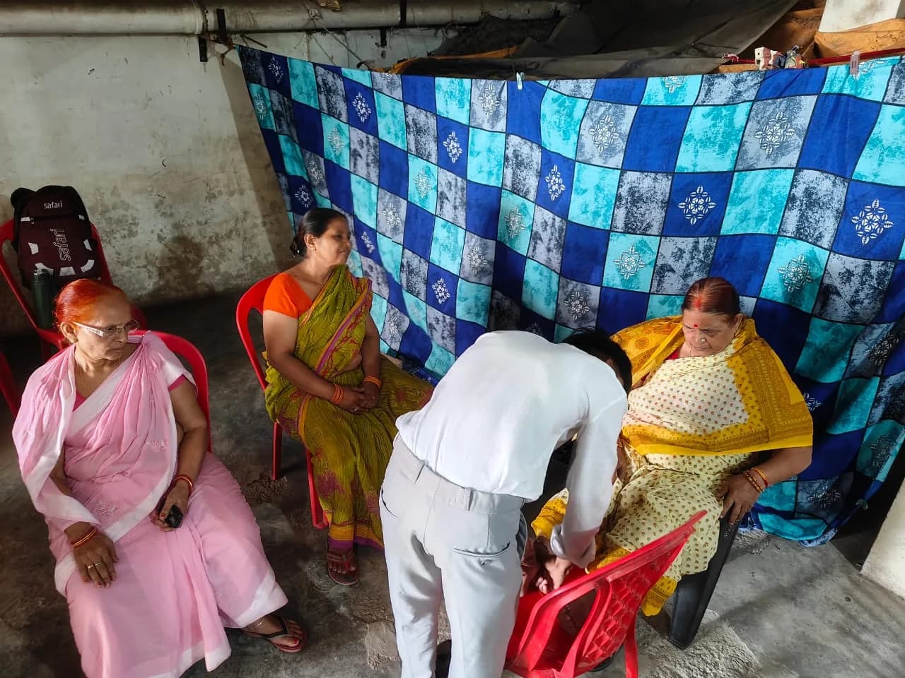 Community programme and participant gathering — photograph 4