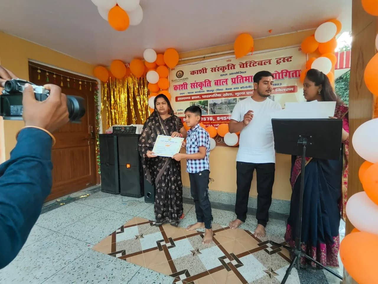 Community programme and participant gathering — photograph 12